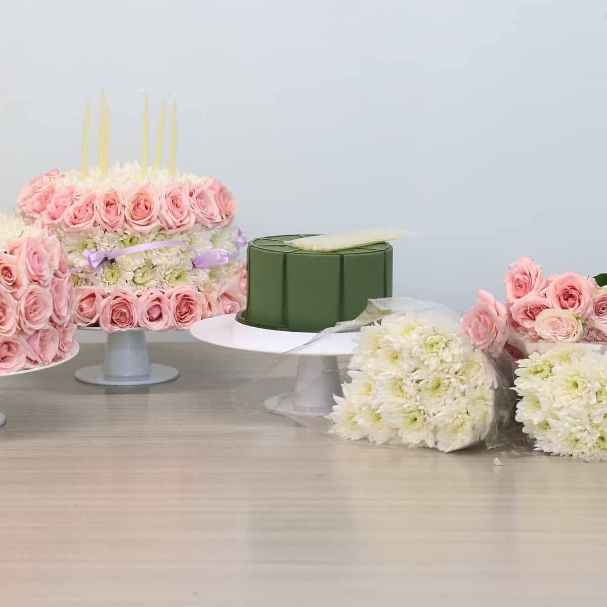 floral cake kit bundle with finished arrangement base candles and flowers
